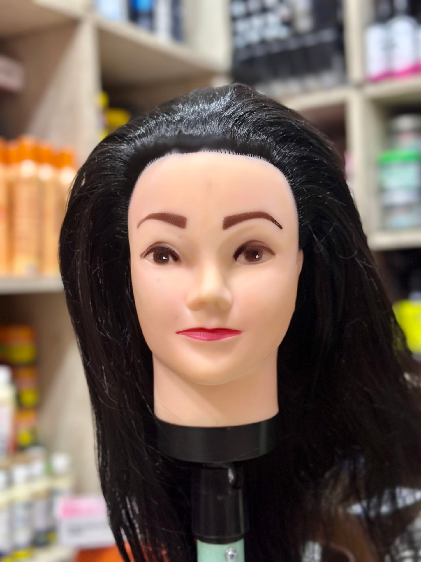 Toy with synthetic hair
